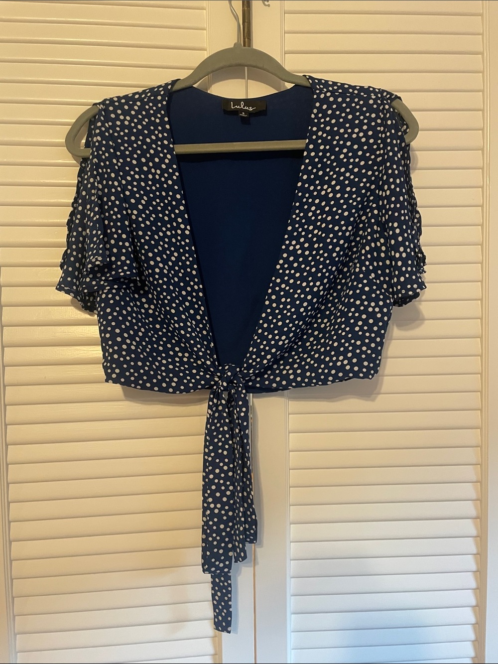 Lulu's Navy and White Polka Dot Tie-Front Cropped Top